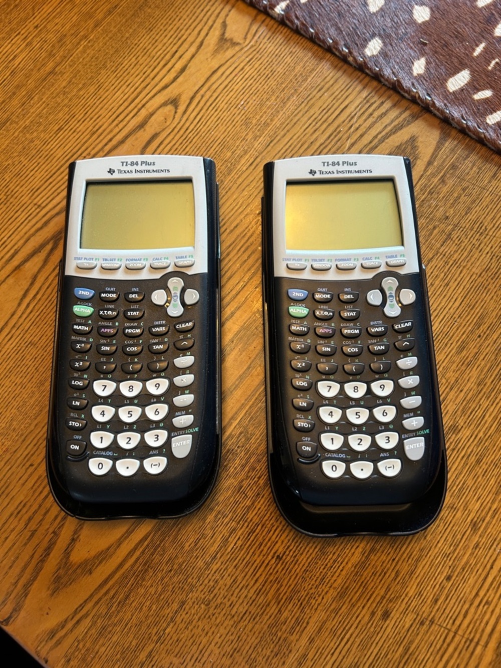 Texas Instruments TI-84 Plus Graphing Calculators — Black and Silver (Pair)